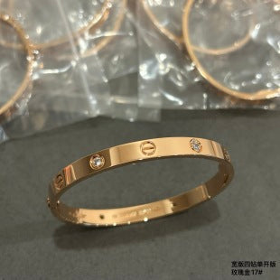 Cartier wide bracelet with four diamonds