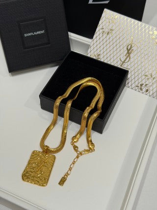 YSL Cassandre Medallion Textured Pendant Necklace